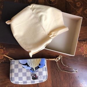 **Sold** Authentic Louis Vuitton Illustre Pochette